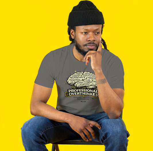 Man wearing a gray t-shirt with text design on a yellow background
