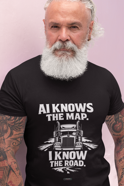 Man wearing a black t-shirt with a truck graphic and text against a light purple background