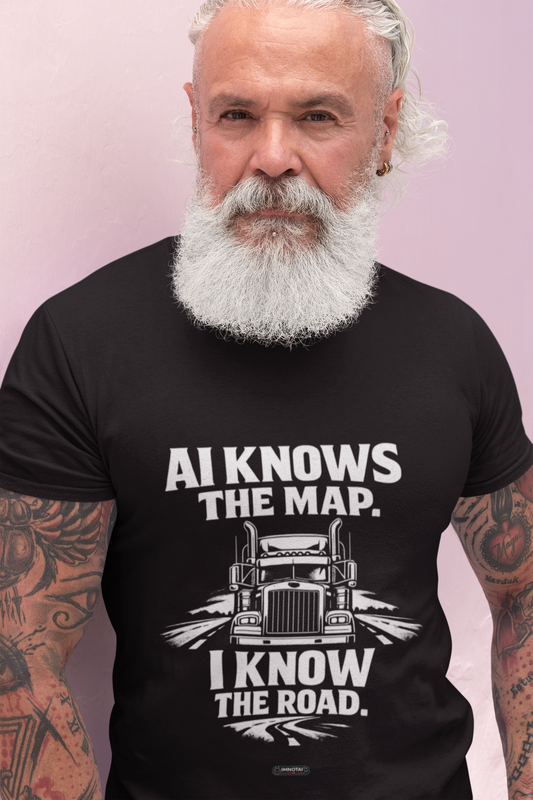 Man wearing a black t-shirt with a truck graphic and text against a light purple background